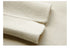 Close-up of clean finished seam on cream wool coat"