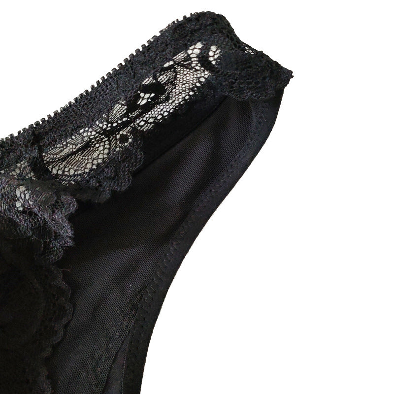 Detail shot of black lace trim and fabric edge showing delicate scalloped design