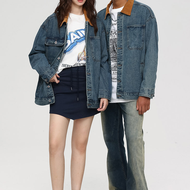 Front view of male and female models in matching oversized denim jackets with brown collars and graphic tees