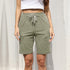Sage green bermuda shorts with drawstring, versatile athleisure wardrobe essential