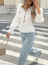 Chic white puff sleeve blouse styled with jeans casual look