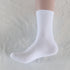 Single white cotton crew sock shown on a white background, highlighting soft texture and classic style