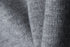 Extreme close-up of heather grey knit fabric showing stitch pattern.