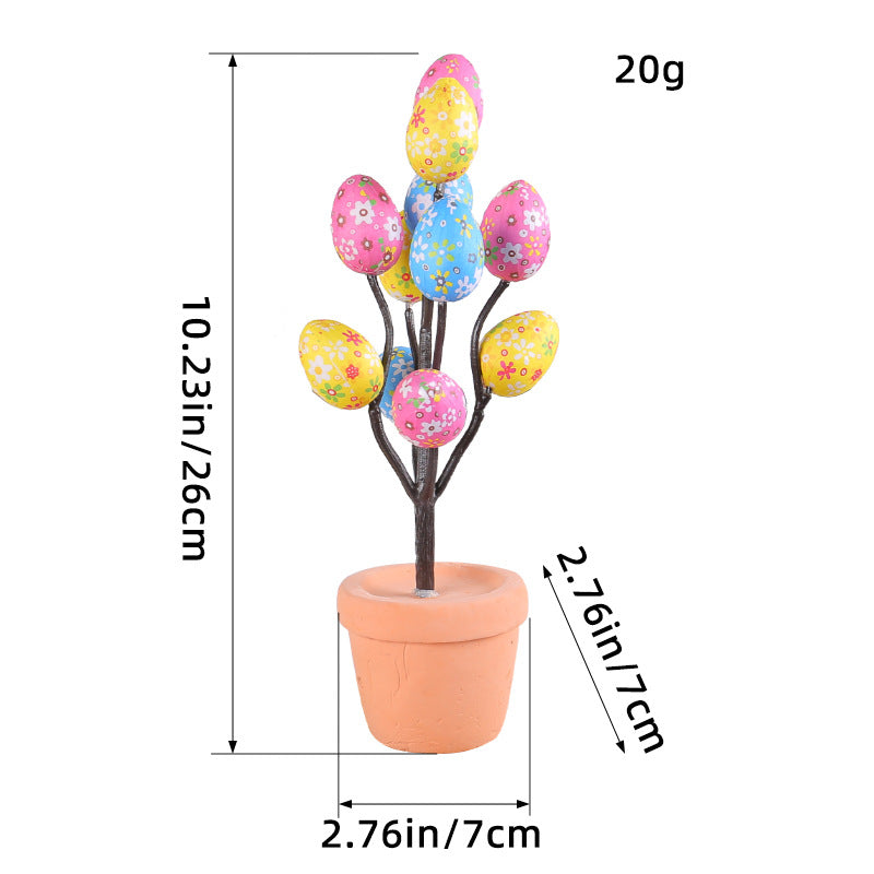 Easter egg tree with floral and polka dot eggs arranged in a terracotta pot, bringing a cheerful spring vibe to any space.
