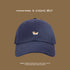 Navy blue baseball cap featuring corgi embroidery detail, summer beach style