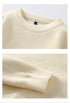 Cream sweater neckline detail showing ribbed collar and knit texture