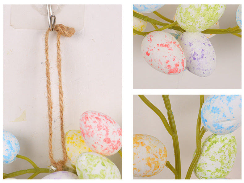 Close-up details of the Easter wreath, highlighting the twine hanger, colorful speckled eggs, and flexible green branches.