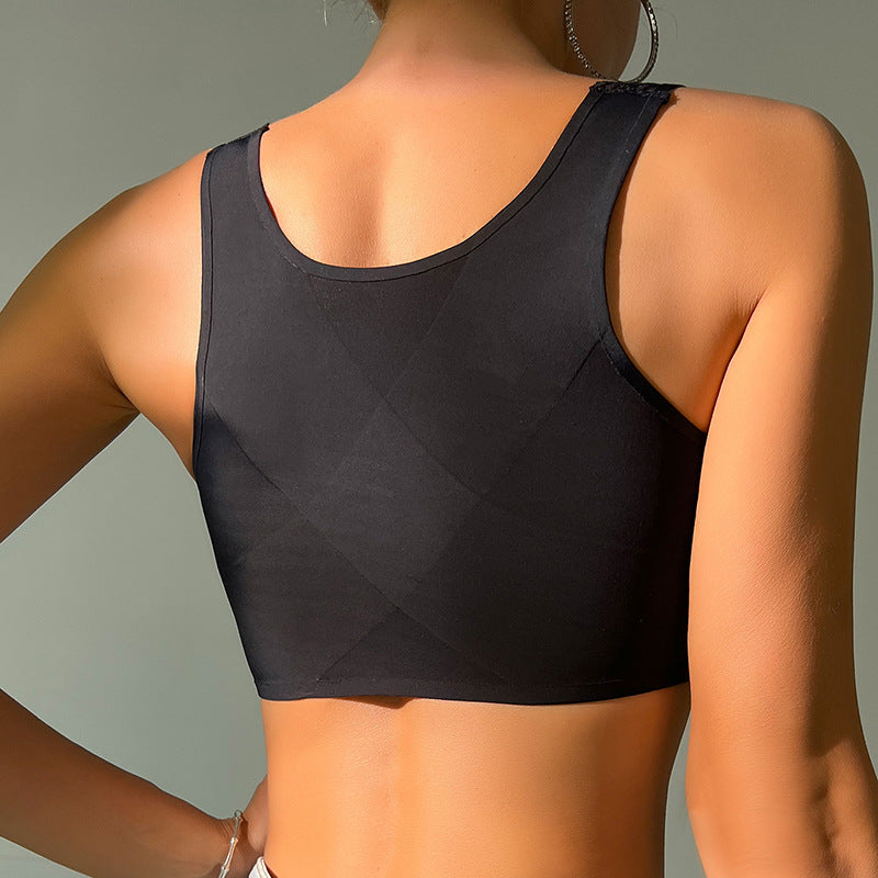 Back view of black seamless sports bra showing crossback design and moisture-wicking fabric texture