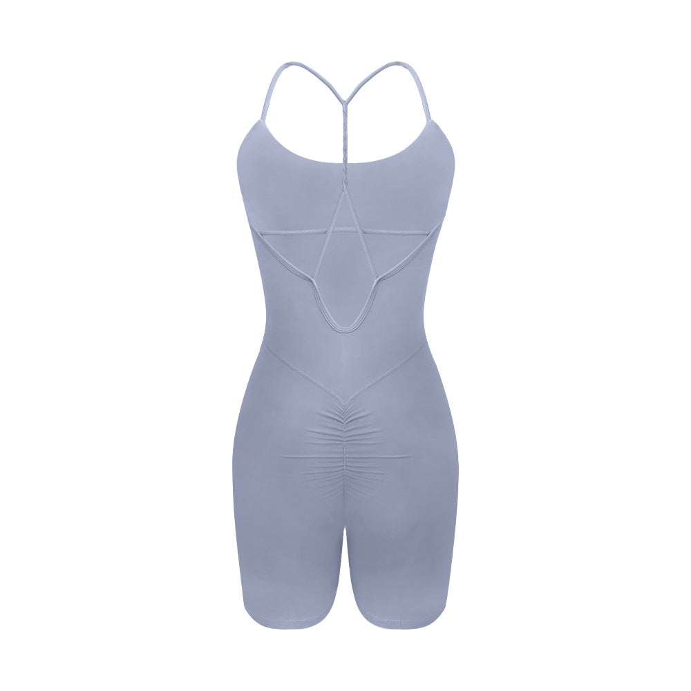 Light gray sleek bodysuit with T-strap back design and built-in compression shorts displayed on white background