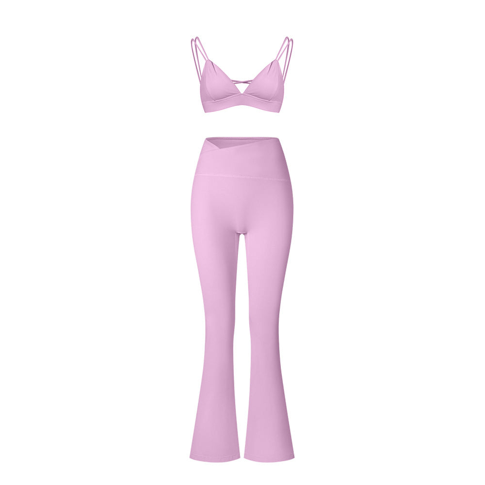 Lilac strappy triangle bralette with matching high-waisted flared yoga pants on white background