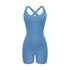 Light blue cross-back bodysuit with scoop neckline and bike short length displayed against white background