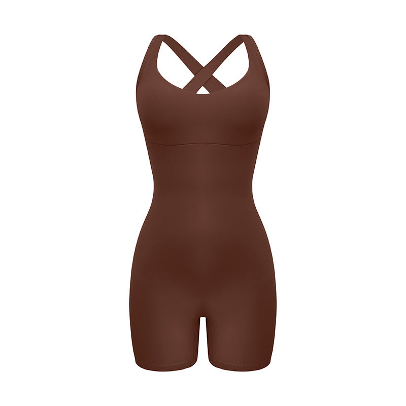 Chocolate brown cross-back bodysuit with sweetheart neckline and bike short length displayed against white background