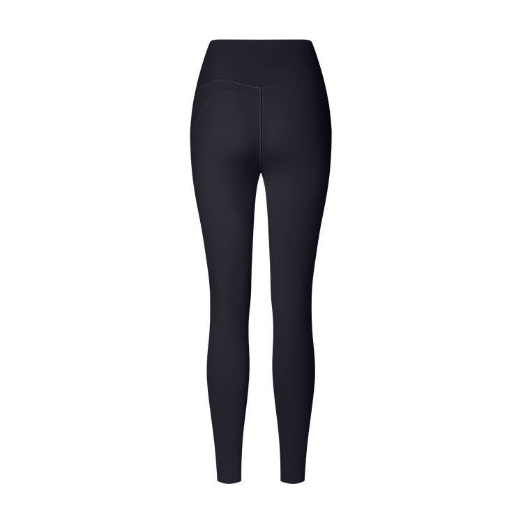 Black high-waisted athletic leggings shown from behind with contoured seam details, photographed against a white background