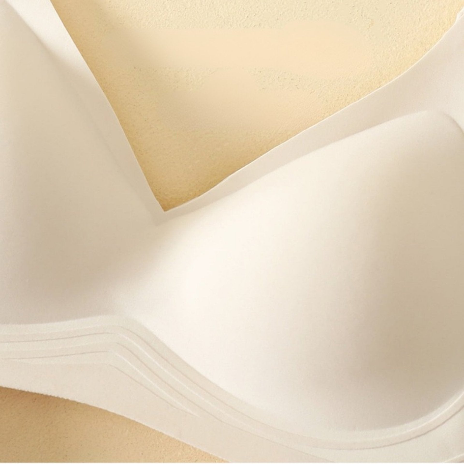 Close-up of a seamless one-piece molded cup for a natural lift and smooth fit.
