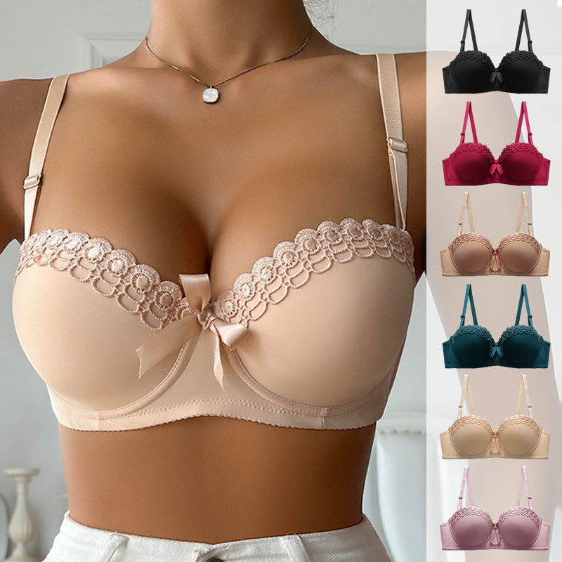 A woman wearing a nude push-up bra with lace trim and delicate pendant necklace, showcasing available color options on right side