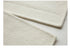 Macro shot showing dense weave structure of cream wool fabric
