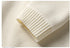 Cream ribbed cuff detail showing elastic finish