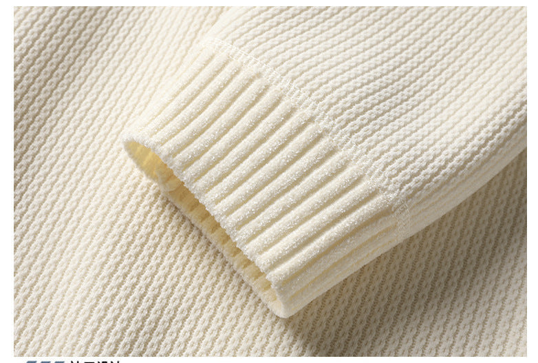 Cream ribbed cuff detail showing elastic finish