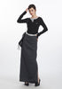 Black and gray layered midi skirt with high side slit, showcasing modern urban fashion styling