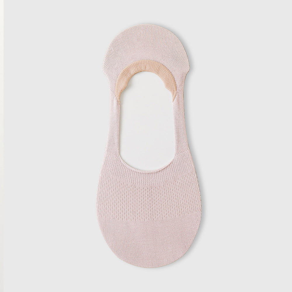 Light pink no-show sock liner with textured knit pattern, photographed on white surface