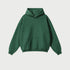 Forest green oversized hoodie with kangaroo pocket on light gray background