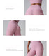 Product feature image showing pink leggings with text highlighting hidden pockets, elastic support, and seamless design
