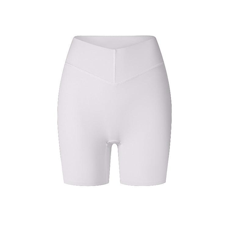 A product image displaying white high-waisted compression shorts with V-shaped waistband and seamless finish against white background