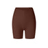 A product image showing brown high-waisted compression shorts with V-cut waistband and mid-thigh length against white backdrop