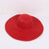Red wide-brimmed sun hat with a structured design, laid flat against a white background.