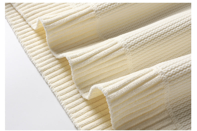 Cream ribbed hem detail showing waffle texture