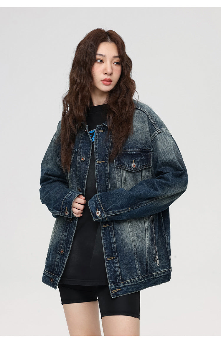 Close-up shot of female model in oversized denim jacket and black t-shirt