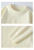 Cream sweater neckline detail