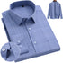 Light blue dress shirt with subtle grid pattern and standard collar. Circular detail shows sleeve cuff with full shirt displayed on wooden hanger against white background