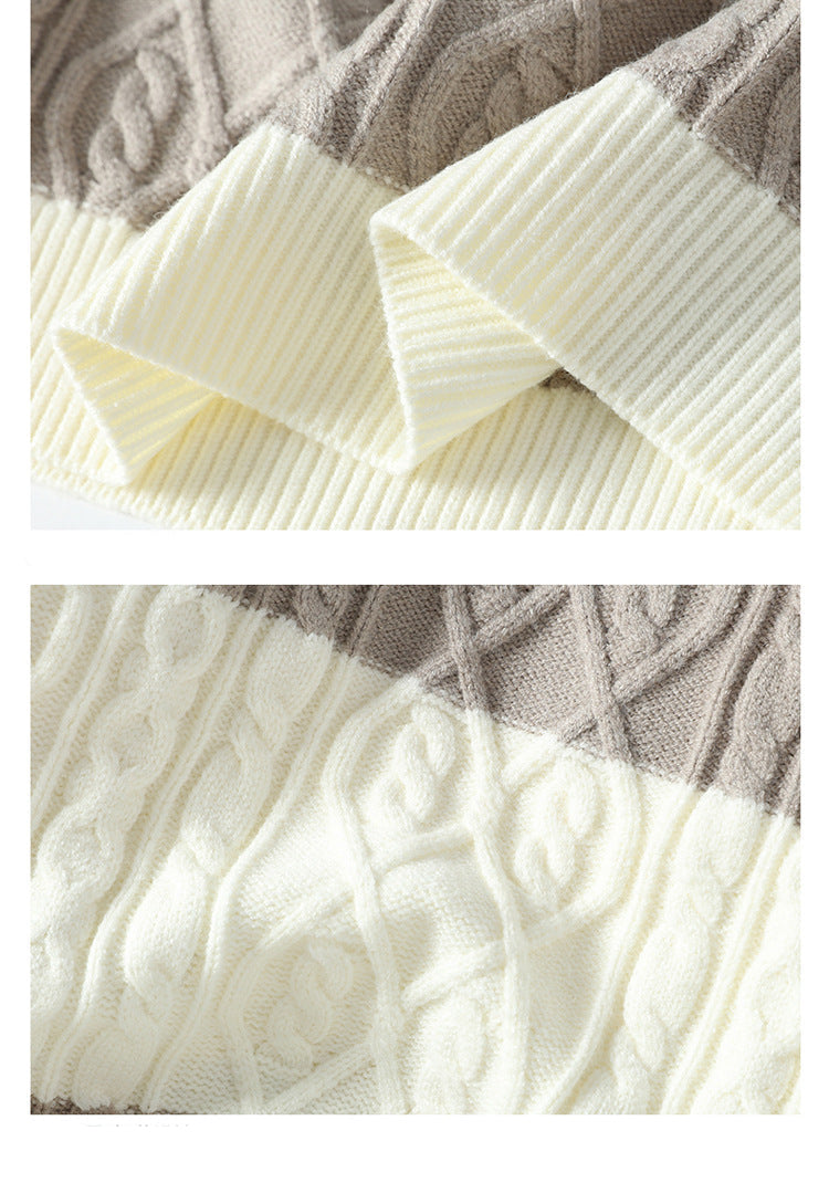 Close-up details of cream ribbed hem and cable-knit pattern