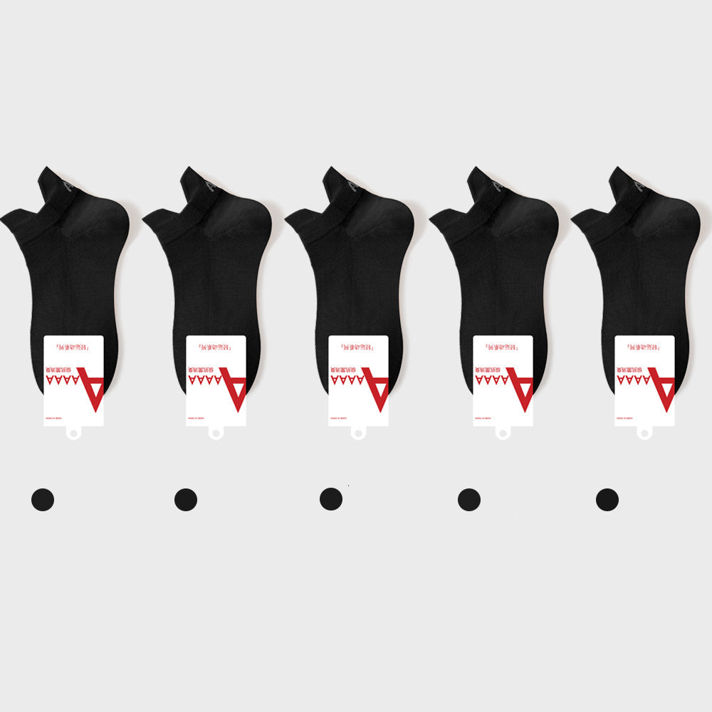 Black antibacterial ankle socks with brand label and quality certification tags, retail presentation