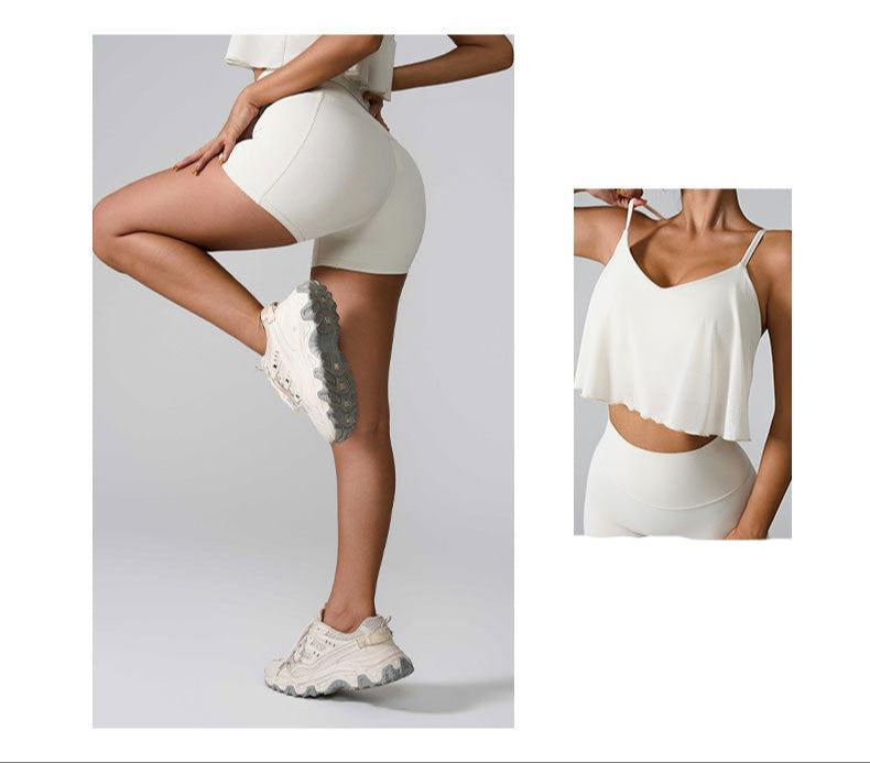 Model in white high-waisted compression shorts and ruffled crop top, showing leg raise pose with white sneakers" + "Close-up of white ruffle-trim crop top