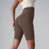 Olive and taupe compression shorts showing high waistband and seamless design details