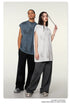 Two models in gray and white oversized t-shirts with black and gray pants against white background