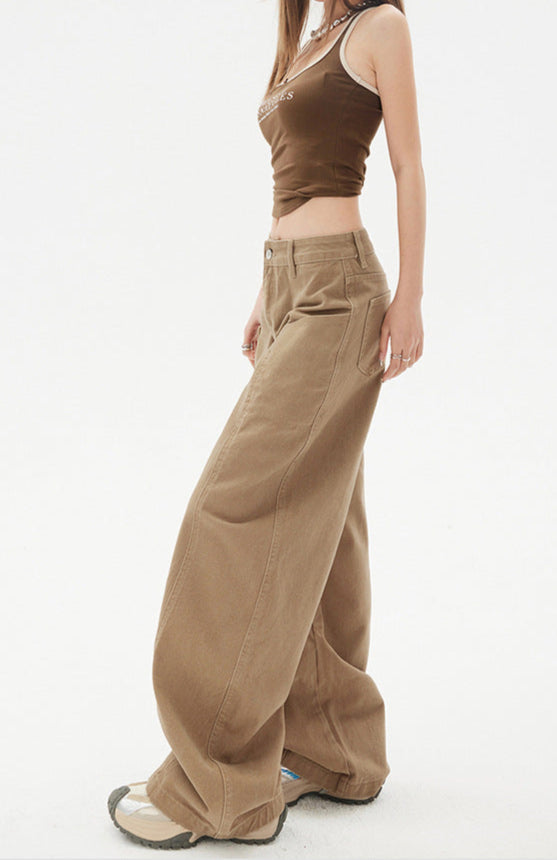 Side view, cropped shot showing flare and volume of pant leg.