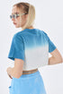 Back view of blue and white ombré cropped t-shirt with periwinkle jogger pants