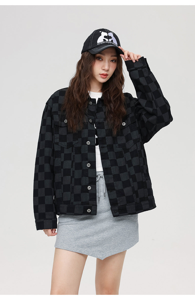 Front view of black checkered jacket with classic collar and utility pockets