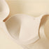 Inside view of a seamless bra with fixed molded cups, designed to provide natural lift and secure fit without pressure.