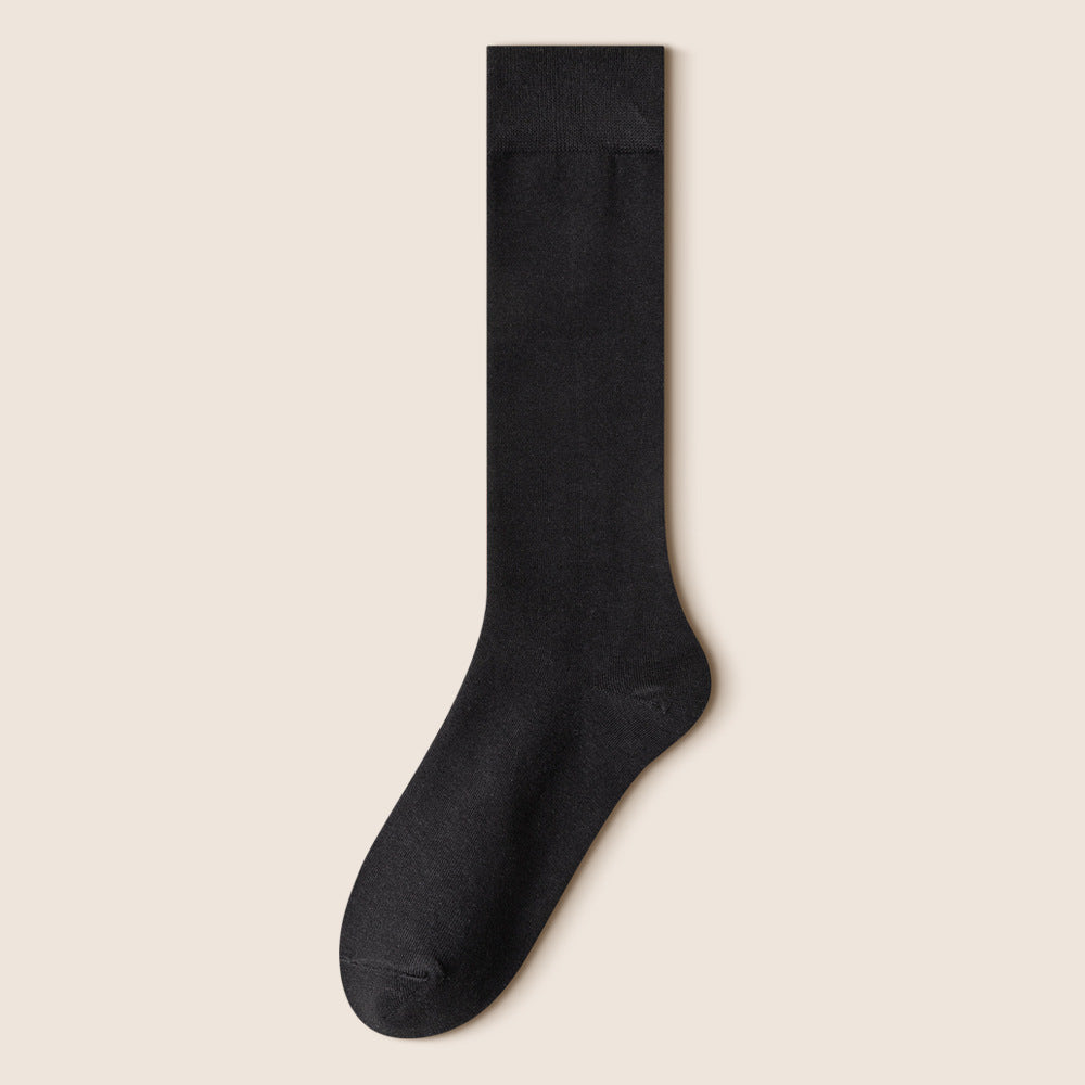 Single black knee-high sock displayed flat showing full length and cuff detail
