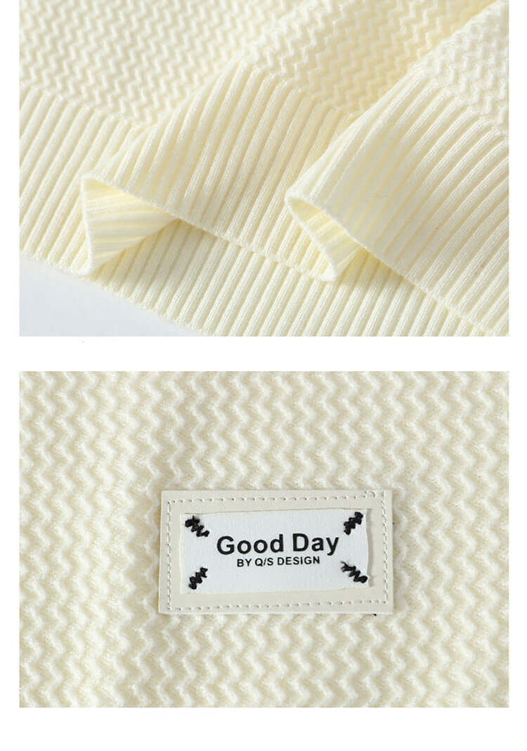 Sweater hem and label detail