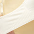 A close-up of the bra's stretchy, seamless side panel, designed for enhanced support and to smooth side bulges.