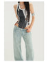 Cropped front view shot: Low-rise denim jeans with wide legs and a vintage Y2K vibe.