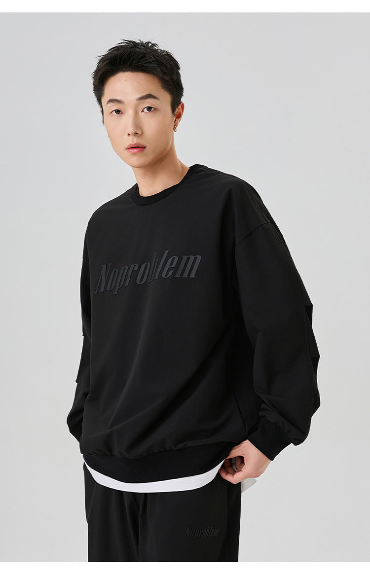 Side profile of the black "NoProblem" sweatshirt, highlighting its casual and versatile appeal