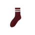 Burgundy crew sock with white triple stripes, made from soft fuzzy material