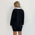 Back view of black California sweatshirt dress showing oversized fit