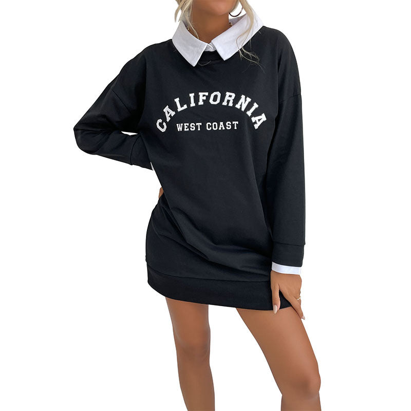 Front view of black California West Coast mini dress with contrast white collar